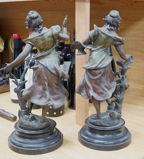 A pair of spelter figures of muses, 38cm. Condition - fair